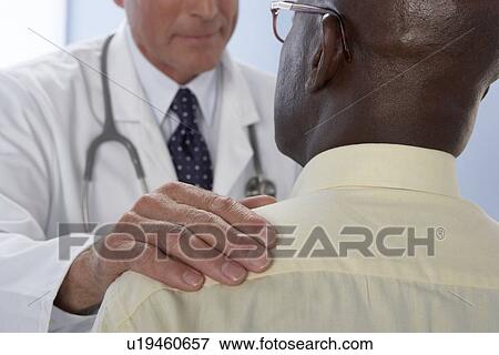 Stock Photo - Medical consultation. Fotosearch