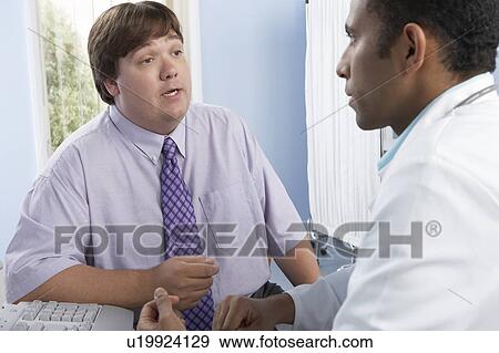 Stock Photo - Medical consultation. Fotosearch