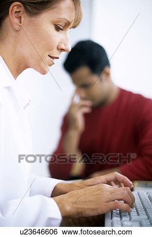 Stock Photograph - Medical consultation. Fotosearch