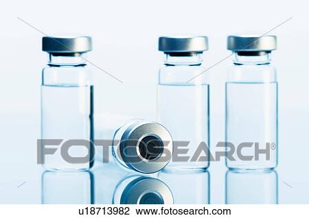 Medical vials. Sealed vials are typically used for storage and distribution of injectable medications (such as vaccines, etc) View Large Photo Image Stock Image - Medical vials. Sealed vials are typically used for storage and distribution of injectable medications (such as vaccines, etc). Fotosearch