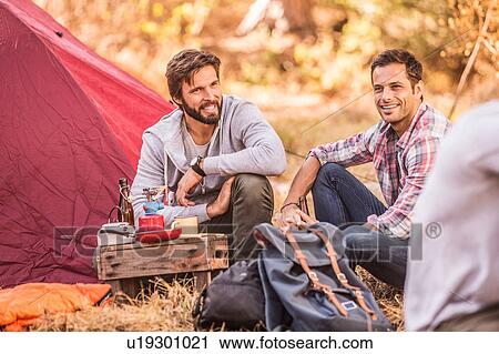 Men camping together in forest, Deer Park, Cape Town, South Africa View Large Photo Image Stock Image - Men camping together in forest, Deer Park, Cape Town, South Africa. Fotosearch