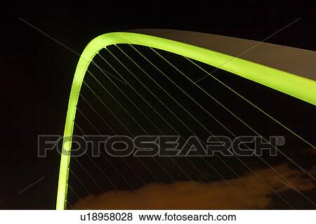 Stock Photo - Millennium Bridge at night, Newcastle, UK. Fotosearch