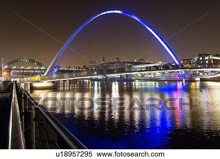 Stock Photography - Millennium Bridge at night, Newcastle, UK. Fotosearch