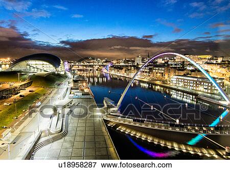 Stock Photo - Millennium Bridge, Tyne Bridge and Sage Gateshead at night, Newcastle, UK. Fotosearch