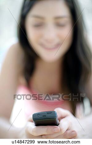 Stock Photo - Mobile phone use. Fotosearch