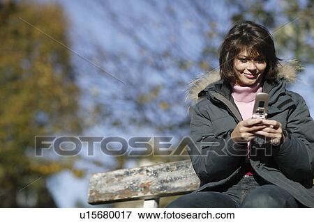 Stock Photo - Mobile phone use. Fotosearch
