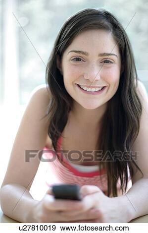 Stock Photo - Mobile phone use. Fotosearch