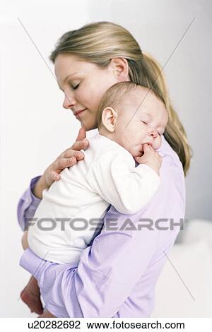 Stock Image - Mother and baby. Fotosearch