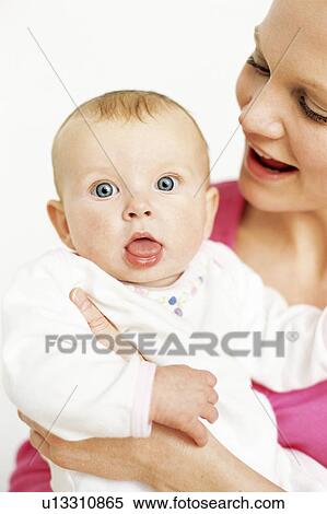 Stock Photography - Mother and baby. Fotosearch