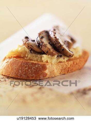 Mushrooms and scrambled egg on crusty baguette slice, close-up View Large Photo Image Stock Image - Mushrooms and scrambled egg on crusty baguette slice, close-up. Fotosearch