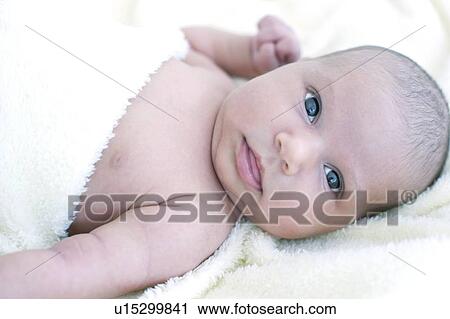 Stock Image - Newborn baby girl. Fotosearch