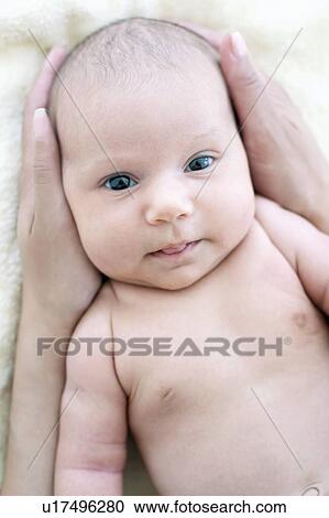 Stock Image - Newborn baby girl. Fotosearch