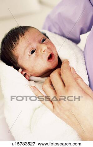 Newborn baby View Large Photo Image Stock Photo - Newborn baby. Fotosearch
