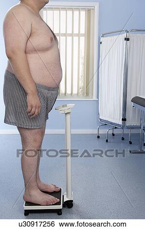 Stock Photograph - Obese man. Fotosearch