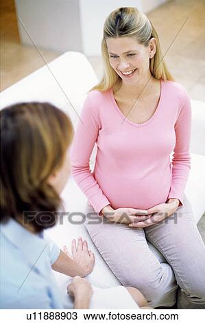 Stock Image - Obstetric examination. Fotosearch