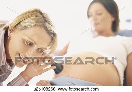 Stock Photo - Obstetric examination. Fotosearch