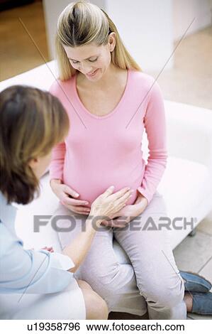 Stock Photograph - Obstetric examination. Fotosearch