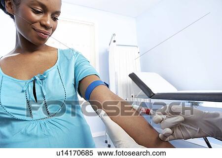 Stock Photography - Obstetric examination. Fotosearch