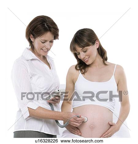 Stock Photograph - Obstetric ultrasound examination. Fotosearch