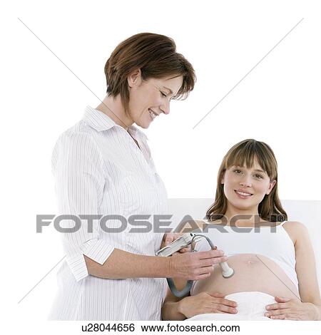 Obstetric ultrasound examination View Large Photo Image Stock Photograph - Obstetric ultrasound examination. Fotosearch