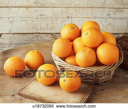 Oranges in wicker basket View Large Photo Image Stock Photography - Oranges in wicker basket. Fotosearch