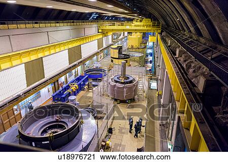 Overview of generator hall in hydroelectric power station View Large Photo Image Stock Image - Overview of generator hall in hydroelectric power station. Fotosearch
