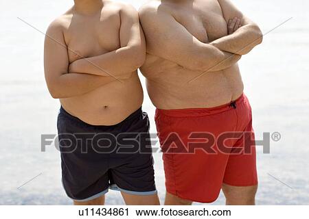 Stock Image - Overweight boy and man. Fotosearch