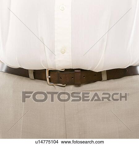 Picture - Overweight man's waist. Fotosearch
