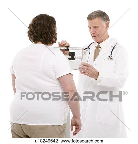 Overweight woman being weighed View Large Photo Image Stock Image - Overweight woman being weighed. Fotosearch