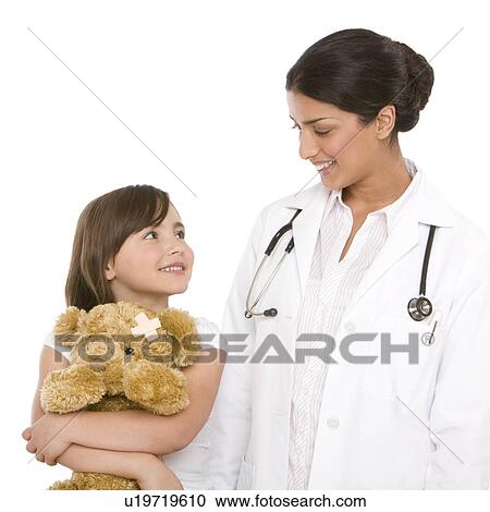 Paediatric doctor and patient View Large Photo Image Stock Image - Paediatric doctor and patient. Fotosearch