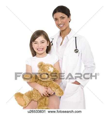 Stock Image - Paediatric doctor and patient. Fotosearch