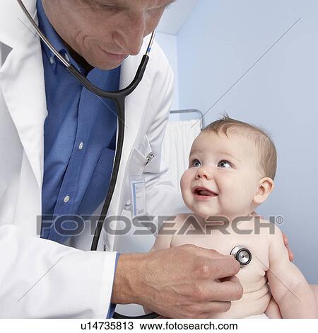 Stock Image - Paediatric examination. Fotosearch