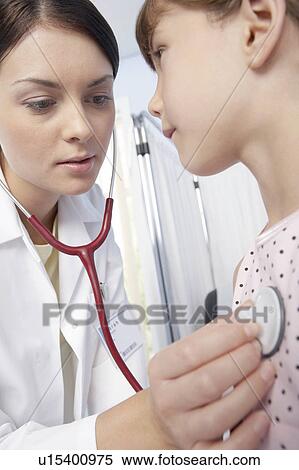 Stock Photography - Paediatric examination. Fotosearch