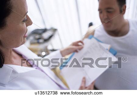 Stock Photo - Patient notes. Fotosearch