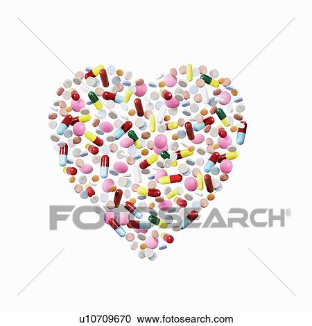 Pills and capsules in heart shape View Large Photo Image Stock Image - Pills and capsules in heart shape. Fotosearch