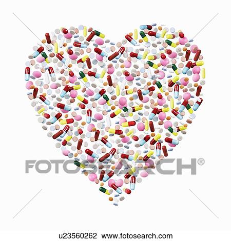 Pills and capsules in heart shape View Large Photo Image Stock Image - Pills and capsules in heart shape. Fotosearch