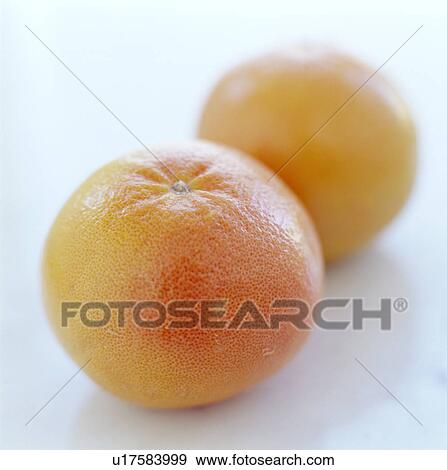 Pink grapefruits View Large Photo Image Stock Photo - Pink grapefruits. Fotosearch