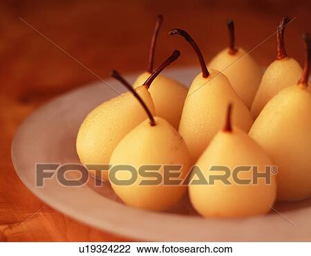 Poached pears on a plate View Large Photo Image Stock Image - Poached pears on a plate. Fotosearch