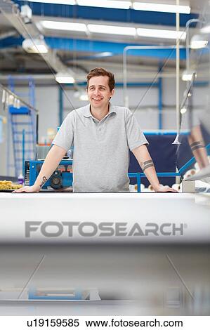 Portrait of factory worker in roller blind factory View Large Photo Image Stock Photography - Portrait of factory worker in roller blind factory. Fotosearch