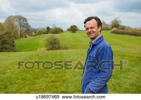 Portrait of farmer in field View Large Photo Image Stock Photo - Portrait of farmer in field. Fotosearch
