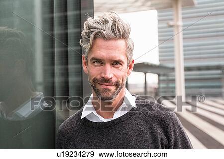 Portrait of mid adult man, outdoors View Large Photo Image Stock Photo - Portrait of mid adult man, outdoors. Fotosearch