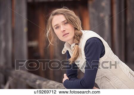 Portrait of mid adult woman outdoors View Large Photo Image Stock Image - Portrait of mid adult woman outdoors. Fotosearch