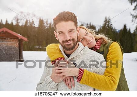 Portrait of romantic couple in snow, Elmau, Bavaria, Germany View Large Photo Image Stock Photo - Portrait of romantic couple in snow, Elmau, Bavaria, Germany. Fotosearch