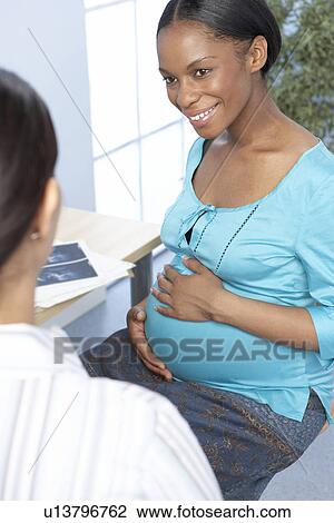 Pregnancy consultation View Large Photo Image Stock Image - Pregnancy consultation. Fotosearch