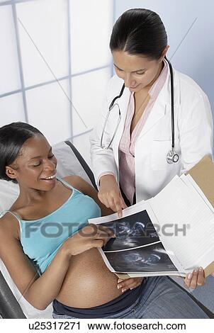 Stock Image - Pregnancy consultation. Fotosearch