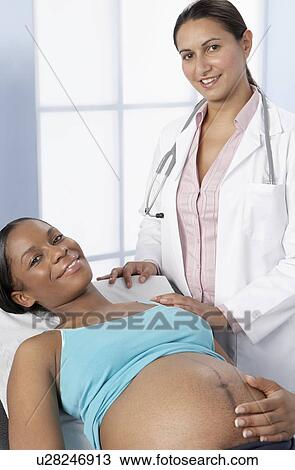 Stock Image - Pregnancy consultation. Fotosearch