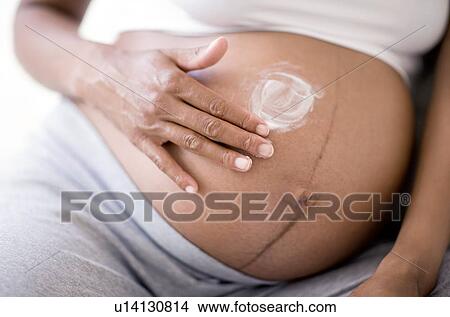 Picture - Pregnant woman. Fotosearch