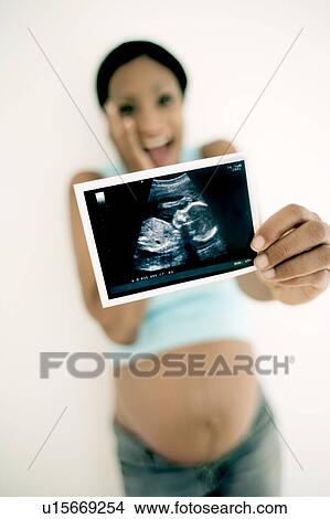 Picture - Pregnant woman. Fotosearch