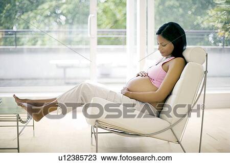 Stock Image - Pregnant woman. Fotosearch