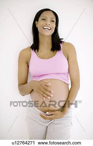 Stock Image - Pregnant woman. Fotosearch